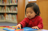 little girll in library