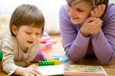 mother teaching child